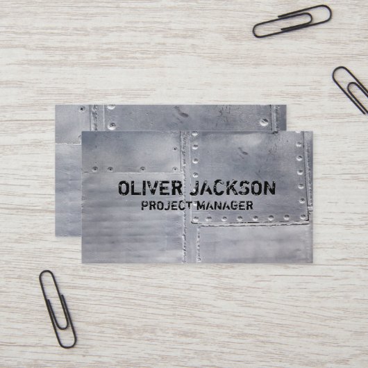 Metalen platen aan elkaar geklonken visitekaartje (Voorkant / Achterkant in situ)