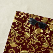 Metallic goud bloemendamast patroon strandlaken (In situ)