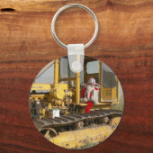 Mevrouw Ella controleert de uitrusting van boerder Sleutelhanger (Voorkant)