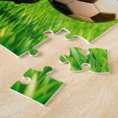Mexicaanse taco-voetbalspeler die over het stadion legpuzzel (Zijkant)