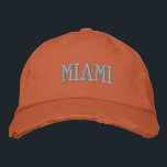 MIAMI Grijs en Oranje Vintage Stijl Vervuild Geborduurde Pet<br><div class="desc">MIAMI Geborduurde vintage stijl versleten oranje katoenen hoed. Maakt een prachtig cadeau voor iedereen die van Miami FL houdt! Als je liever je eigen tekst erop wilt, selecteer dan de "Personaliseer deze sjabloon" knop om je eigen tekst in te voeren. Het borduurwerk is ook aanpasbaar naar andere kleuren door de...</div>