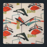 Mid Century Modern Atomic Fabric Wall Clock Vierkante Klok<br><div class="desc">Elke dag kan een ontploffing uit het verleden zijn met deze moderne, geïnspireerde muurklok uit de midden eeuw. Het ontwerp is voorzien van een replica van een patroon van de atomaire mobiele stof. De achtergrond is ecru met blauwe, oranje, groene en zwarte moderne kunstvormen. Dit is de ideale muurklok voor...</div>