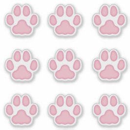 Middelgrote kattenverf drukt roze stalen kogels af sticker