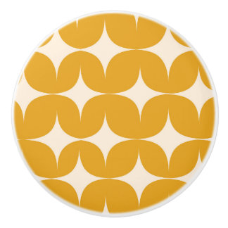 Midden eeuw modern beige stervormen op oranje keramische knop