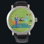 Midden-eeuw modern koppel horloge<br><div class="desc">Dit Mid Century Modern Couple Watch ziet eruit als een scène uit een romantische komedie. Het minimalistische kunstontwerp uit de jaren 60 is voorzien van een aantrekkelijk cartoon-stel dat thuis een romantische avond beleeft. De verfijnde kamer is prominent voorzien van een groene stenen muur met een brullend vuur in de...</div>