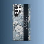 Midnight Blossom Samsung Galaxy Hoesje<br><div class="desc">Samsung Hoesje: Versier je Samsung telefoon met dit prachtige florale hoesje, met grote witte bloesems en zachtblauwe bladeren op een bleke rokerige blauwe achtergrond. Het op vintage geïnspireerde ontwerp en het gepersonaliseerde handgeschreven lettertype op een donkerblauwe banner voegen een vleugje elegantie toe aan uw toestel. Dit hoesje biedt volledige bescherming...</div>