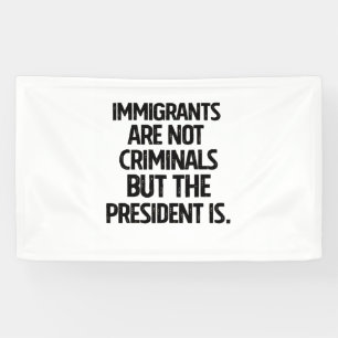Migranten zijn geen criminelen maar de president w spandoek
