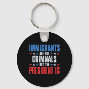 Migranten zijn geen criminelen, maar het President Sleutelhanger