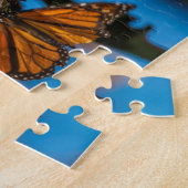 Migrating monarch butterflips cling to leaves legpuzzel (Zijkant)