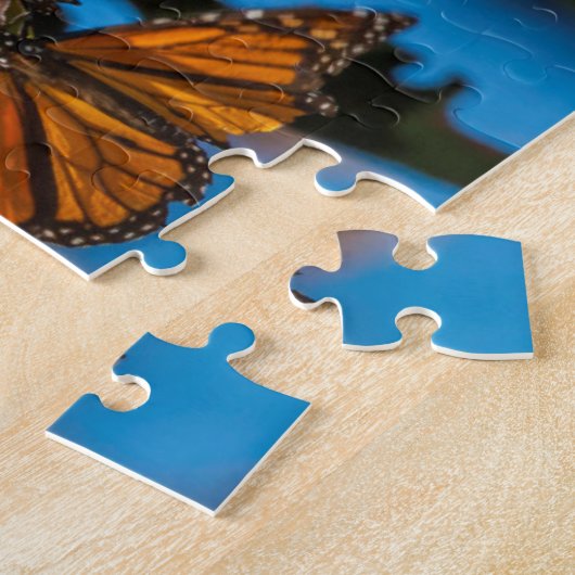 Migrating monarch butterflips cling to leaves legpuzzel (Zijkant)