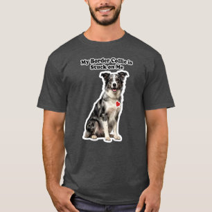 Mijn blauwe merle bordercollie zit vast aan mij t-shirt