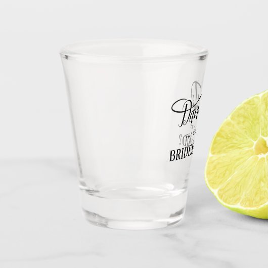 Mijn handgeschreven waskalligrafie in het briefje shot glas (Links)