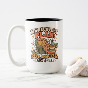 Mijn herstelplan: rust, snacks en geen schuldgevoe tweekleurige koffiemok