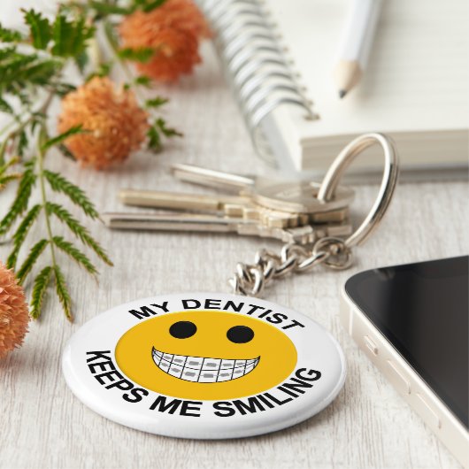 Mijn tandarts houdt me aan het glimlachen - gezich sleutelhanger (Zijkant)