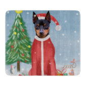 Miniatuur Pinsch Dog in sneeuw met kerstcadeaus Snijplank (Voorkant)