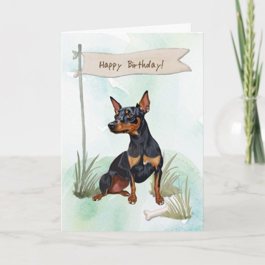 Miniatuur Pinscher hond onder verjaardagsbord Kaart (Voorkant)