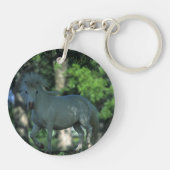 Miniatuurpaarden die in de bomen staan sleutelhanger (Achterkant)