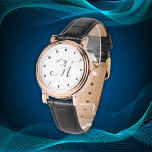 Minimaal enkelvoudig Initiaal Monogram Numeralen Z Horloge<br><div class="desc">Ervaar tijdloze elegantie met dit prachtige horloge met een klassiek rozen gouden hoesje in combinatie met een op vintage geïnspireerde zwarte band. Het verfijnde ontwerp omvat een verfijnde zwarte wijzerplaat met minimalistische cijfers en een delicaat initialen monogram, waardoor een chique contrast ontstaat met de warme rozen goudtinten. Ideaal voor het...</div>