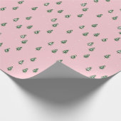 Minimaal kerstboombos op roze cadeaupapier (Hoek)