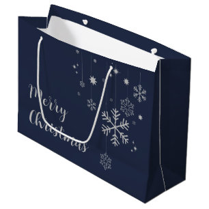 Minimaal kerstontwerp met sneeuwvlokken groot cadeauzakje