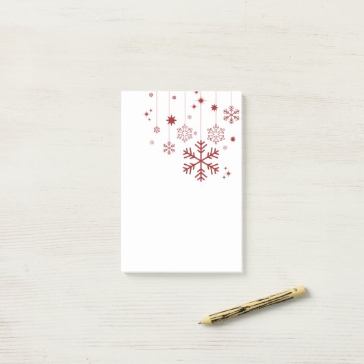 Minimaal kerstontwerp met sneeuwvlokken post-it® notes (Op bureau)