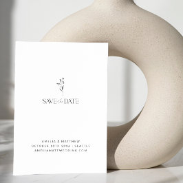 Minimale botanische trekbruiloft met witte flora save the date