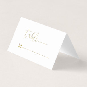 Minimale goudkalligrafie op wit visitekaartje