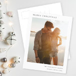 Minimale kerstfoto Eenvoudig Informal Modern Feestdagenkaart<br><div class="desc">Een stijlvol, minimaal fotovakantiegericht briefkaart met een klassieke typografie "Vrolijk kerstfeest" in het zwart op een eenvoudige, minimalistische witte achtergrond. De foto, de vakantiegroet en de tekst kunnen gemakkelijk voor een persoonlijke aanraking worden aangepast. Een eenvoudig, minimalistisch en hedendaags kerstontwerp om dit vakantieseizoen te weerstaan! Het getoonde afbeelding is voor...</div>