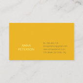 Minimale moderne legante-melkventilator op geel visitekaartje (Achterkant)