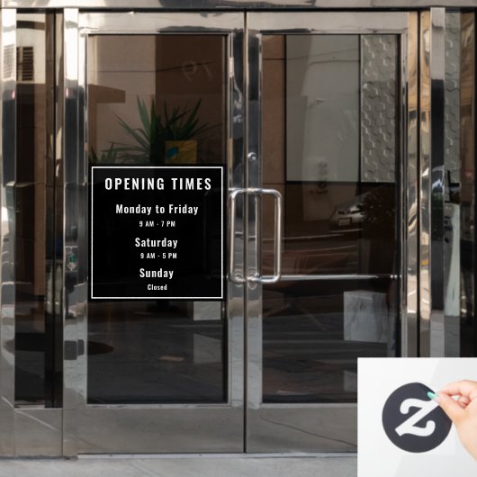 Minimale openingstijden zwart raamsticker (Kantoordeur)