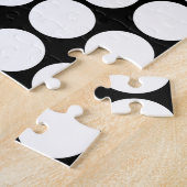Minimale witte stippen op een effen zwarte achterg legpuzzel (Zijkant)