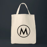 Minimale zwarte Elegant Monogram Tote Bag<br><div class="desc">Dit moderne ontwerp van de canvas tas biedt een minimalistisch elegant monogram met uw initiaal in vetgedrukte zwarte tekst voor een eenvoudige en professionele uitstraling.</div>