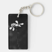 minimale zwarte en witte bloemen sleutelhanger (achterkant)