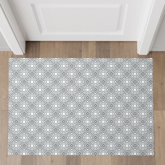 Minimale zwarte en witte geometrische deurmat