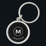 Minimale zwarte klassieke monogram sleutelhanger<br><div class="desc">Minimale monogrammed ronde sleutelhanger is voorzien van een zwarte achtergrond met uw initiaal en naam in klassieke bloktypografie in wit voor een eenvoudige klassieke professionele uitstraling.</div>