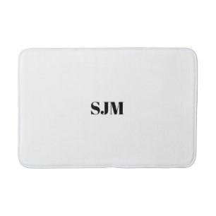 Minimale zwarte witte monogram badmat