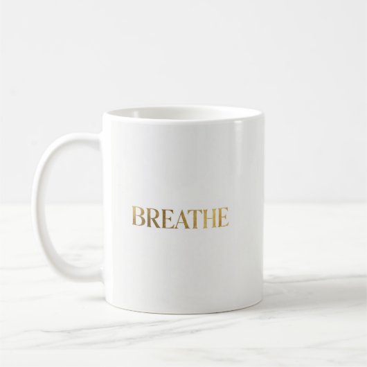 Minimalist typography with gold word breathe koffiemok (Links)