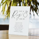 Minimalist zet een ring op het vrijgezellenfeest reclamebord met voetstuk<br><div class="desc">Vermaak uw gasten met dit plezier zet een ring op het vrijgezellenfeest ringspel,  kenmerkt stijlvol modern manuscript en tekst,  eenvoudig en schoon,  geweldig voor vrijgezellenfeest,  en trouwpartijen. Bekijk alle vrijgezellenfeest games in collectie.</div>
