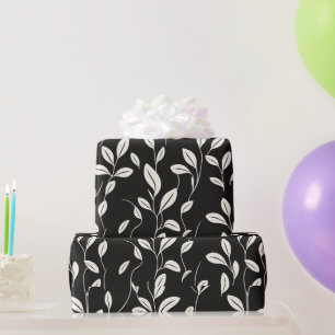 Minimalistisch bladpatroon op zwart cadeaupapier
