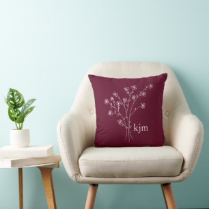 Minimalistisch bloemig monogram kussen