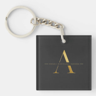 Minimalistisch goud ontwerp met succesdiscipline sleutelhanger
