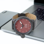 Minimalistisch modern donkerrood monogram horloge<br><div class="desc">Dit moderne ontwerp heeft typografische initialen en naam voor een minimalistisch gevoel dat gemakkelijk kan worden gepersonaliseerd.</div>