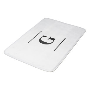 Minimalistisch wit enkelvoudig monogram badmat