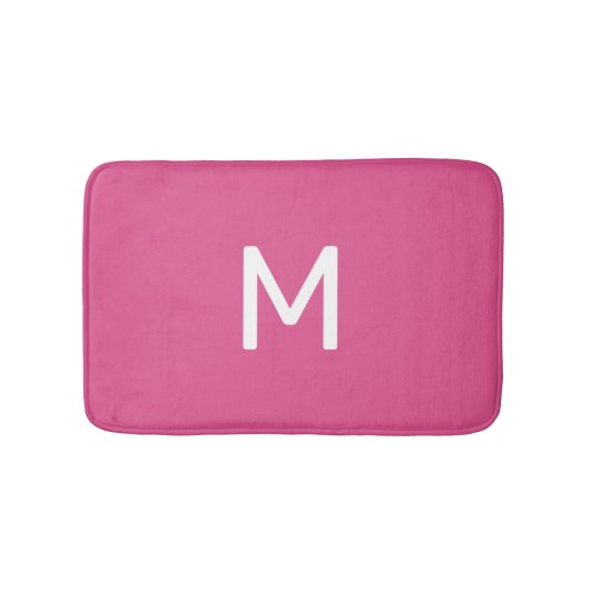 Minimalistisch wit monogram op roze badmat (Voorkant)