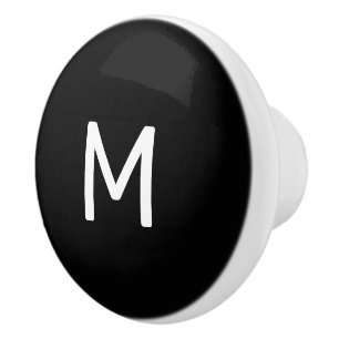 Minimalistisch wit print monogram op zwart keramische knop