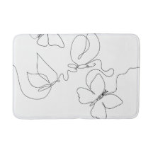 Minimalistische badmat met vlinder