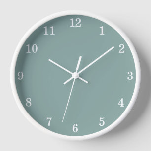 Minimalistische bleke turquoise wandklok