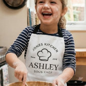 Minimalistische chefshoofdkeukenlogo met klassieke schort