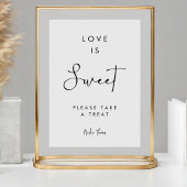 Minimalistische handtekening script liefde is zoet reclamebord met voetstuk