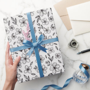 Minimalistische inktbloemen op wit cadeaupapier